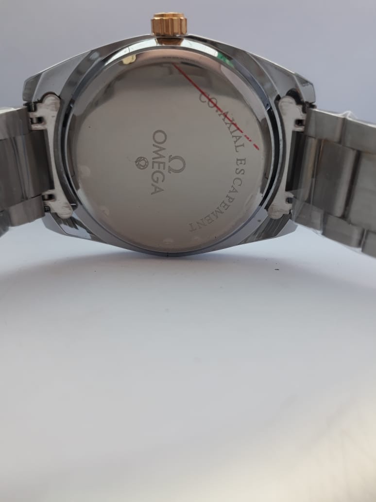 Omega watch caseback on a white background