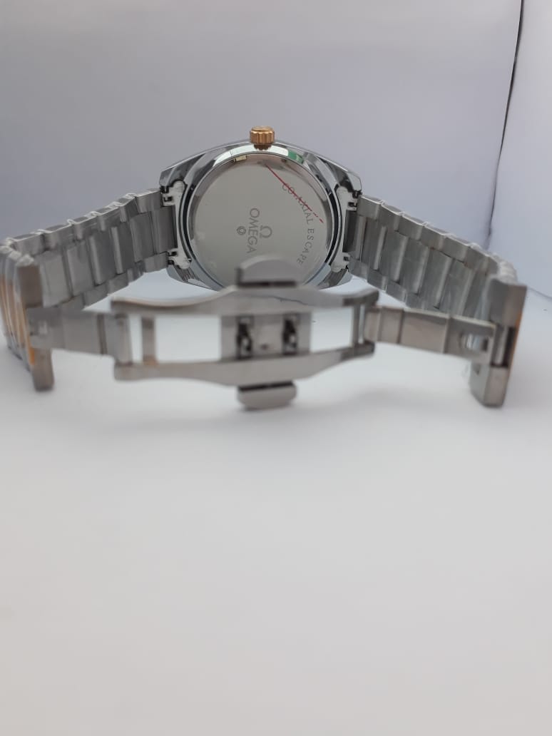 Silver watch with a metal band on a white background